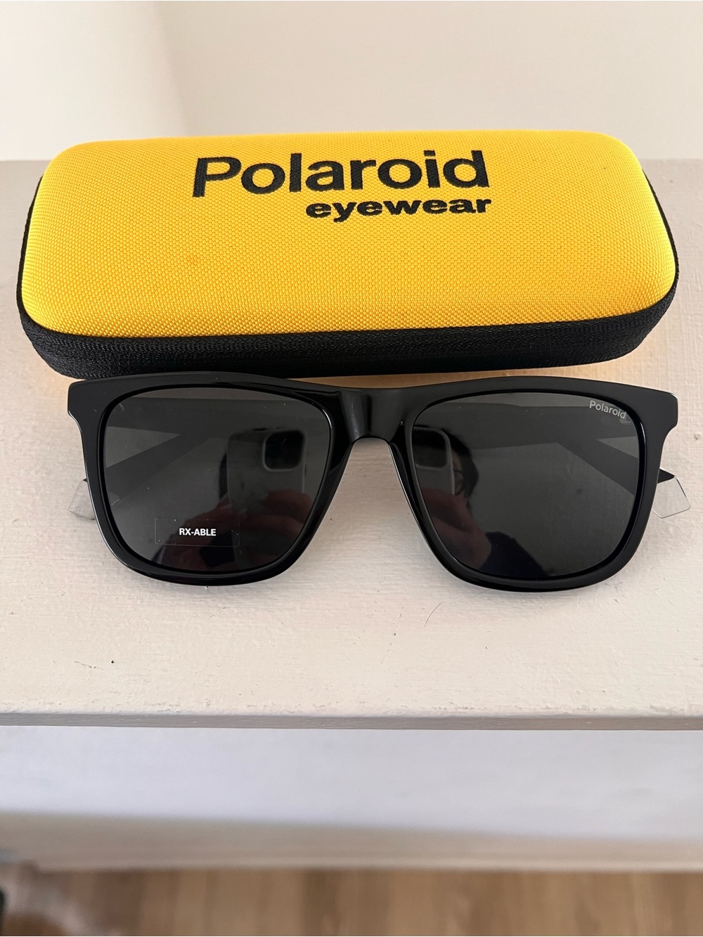 Polaroid Black Sunglasses with Yellow Case
